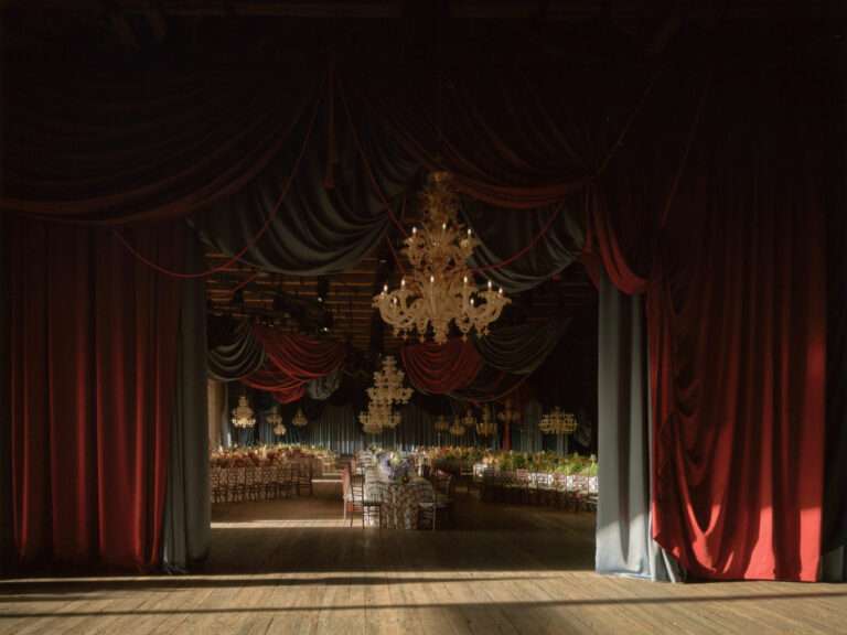 Elegant dining setup with refined decorations at Dior party in Venice Arsenal