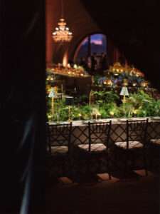 Dior party at the Venice Arsenal, featuring elegant décor and lively atmosphere