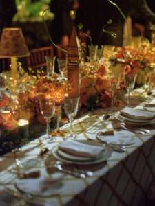 Detailed view of table setting with luxurious elements at Dior celebration