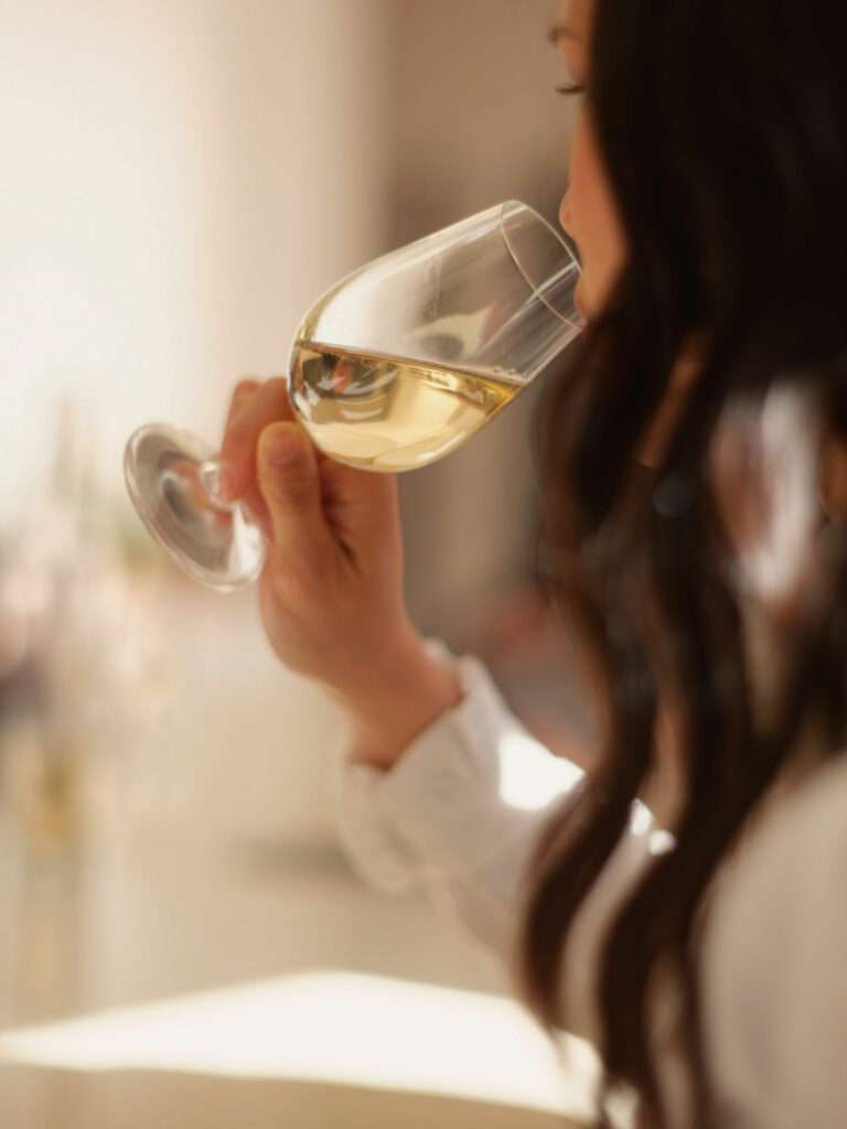 Portrait of Krug Champagne tasting expert in a natural, warm setting