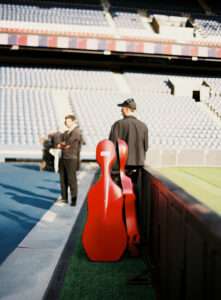 Orchestra performing during Ligue 1 closing ceremony led by Thomas Roussel