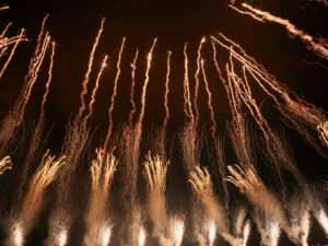 Fireworks illuminating the orchestra conducted by Thomas Roussel at Ligue 1 closing
